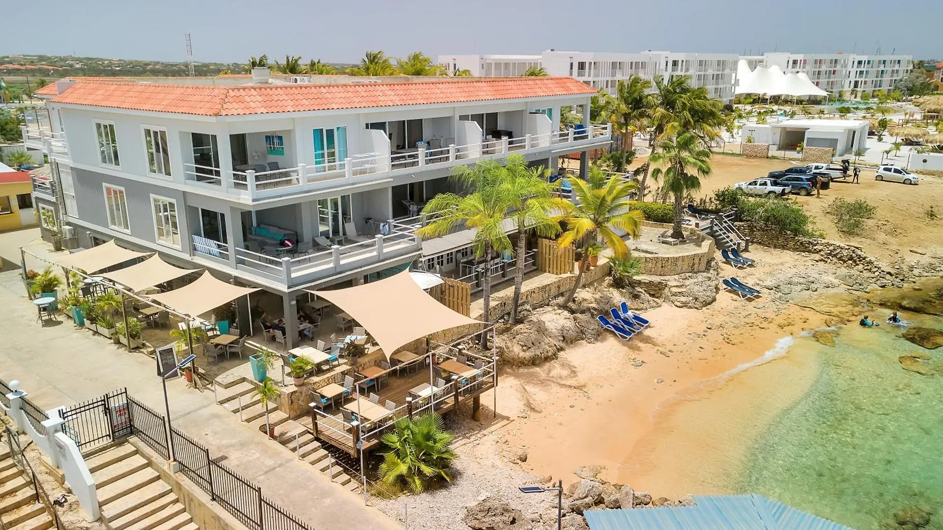 Oceanfront Flying Fish At Den Laman contacts